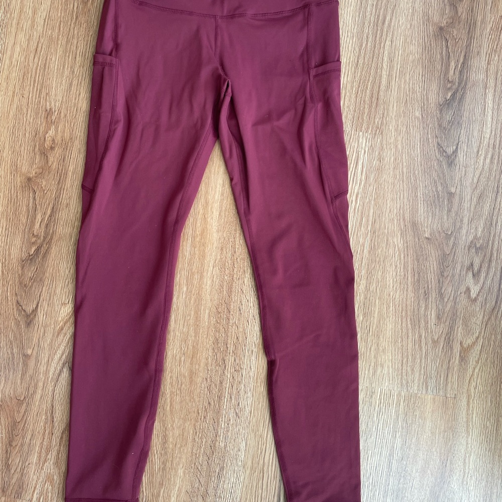 3/4 length burgundy legging with pockets size small